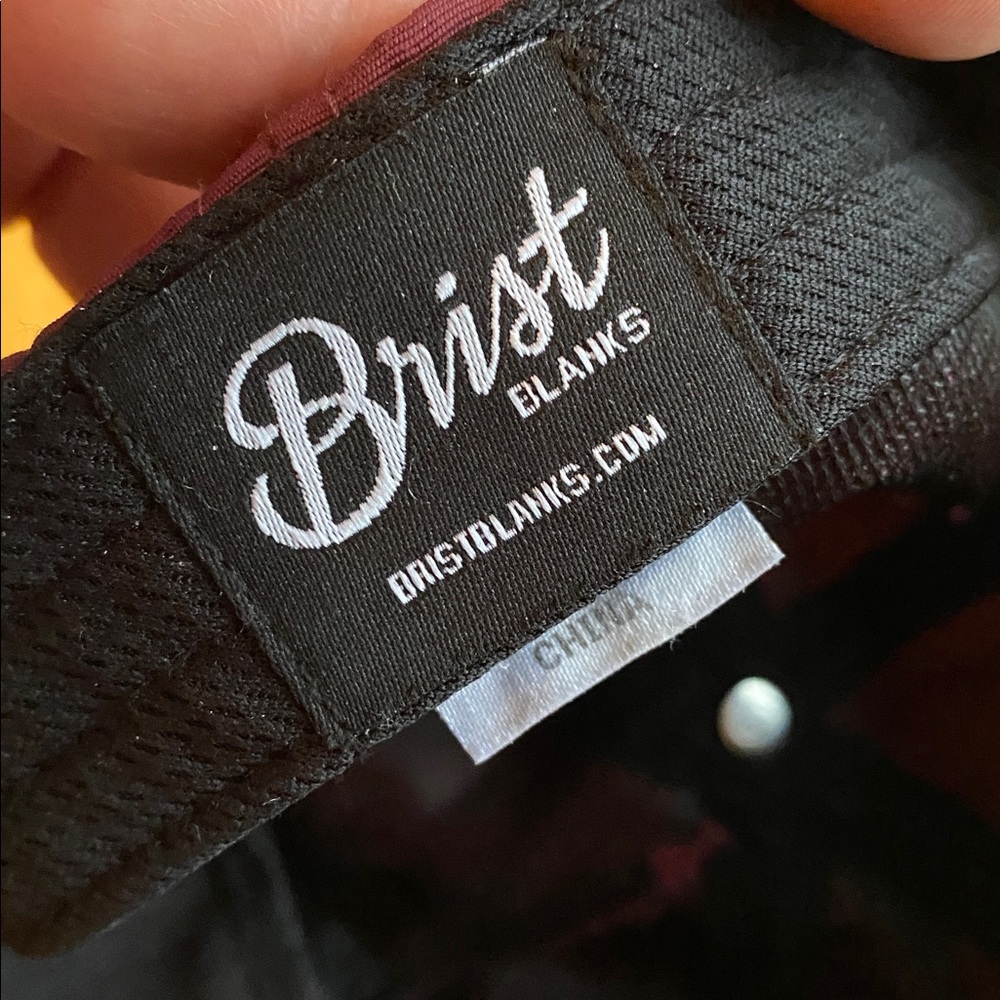 The baseball style cap. It includes a icon patch (the tree logo shown), a rope - Picture 6 of 9